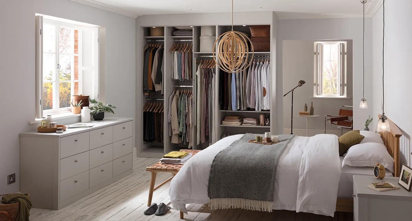 A sleek sliding door wardrobe with drawers from BoxenSpace, perfect for a modern, space-saving bedroom.