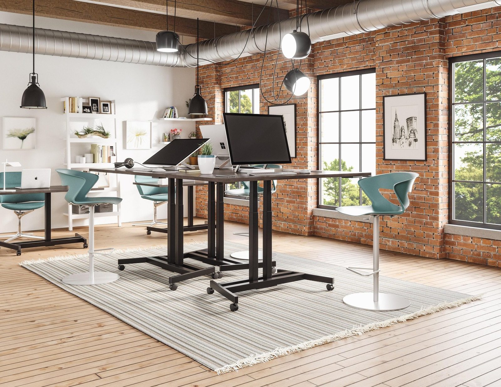 Sleek modern desk with slim legs and storage drawers for laptops and monitors