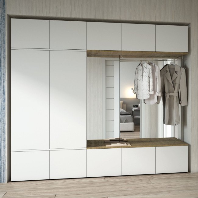 Contemporary wardrobe in the hallway with sleek doors and interior compartments maximising entryway functionality