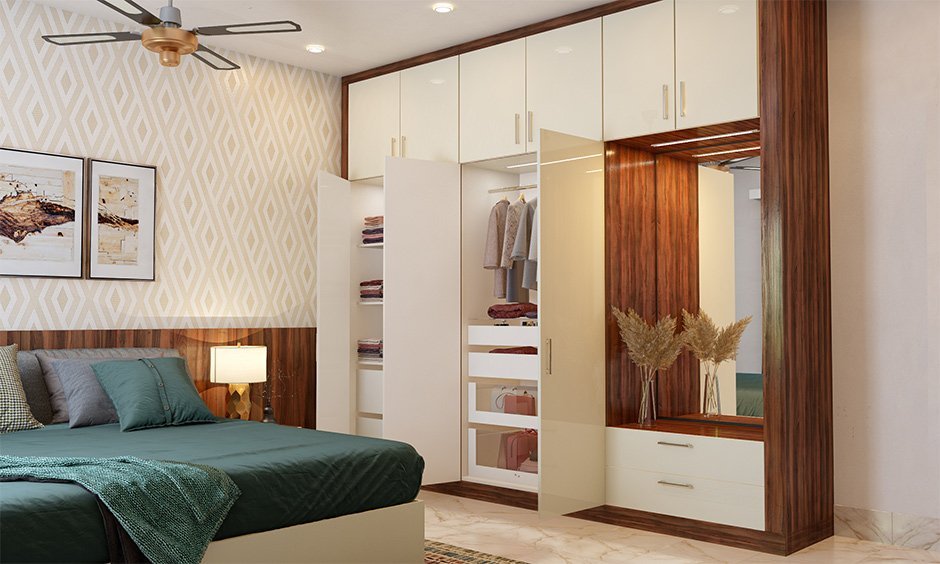Detail shot showing the internal drawers of a sliding door wardrobe, combining style and functionality.