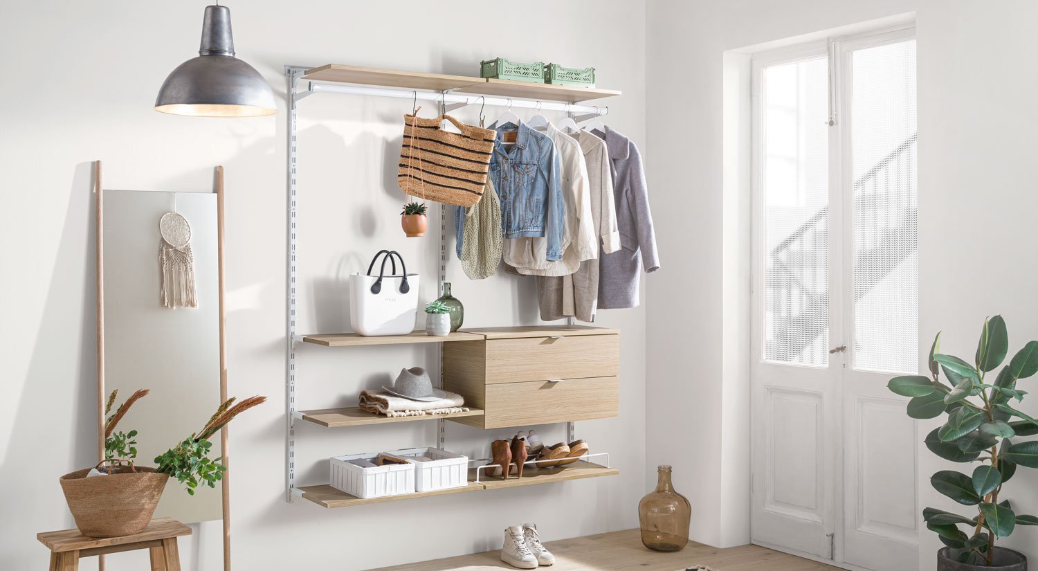 Compact small hallway wardrobe with coat hanging rail and shoe compartments in minimalist design